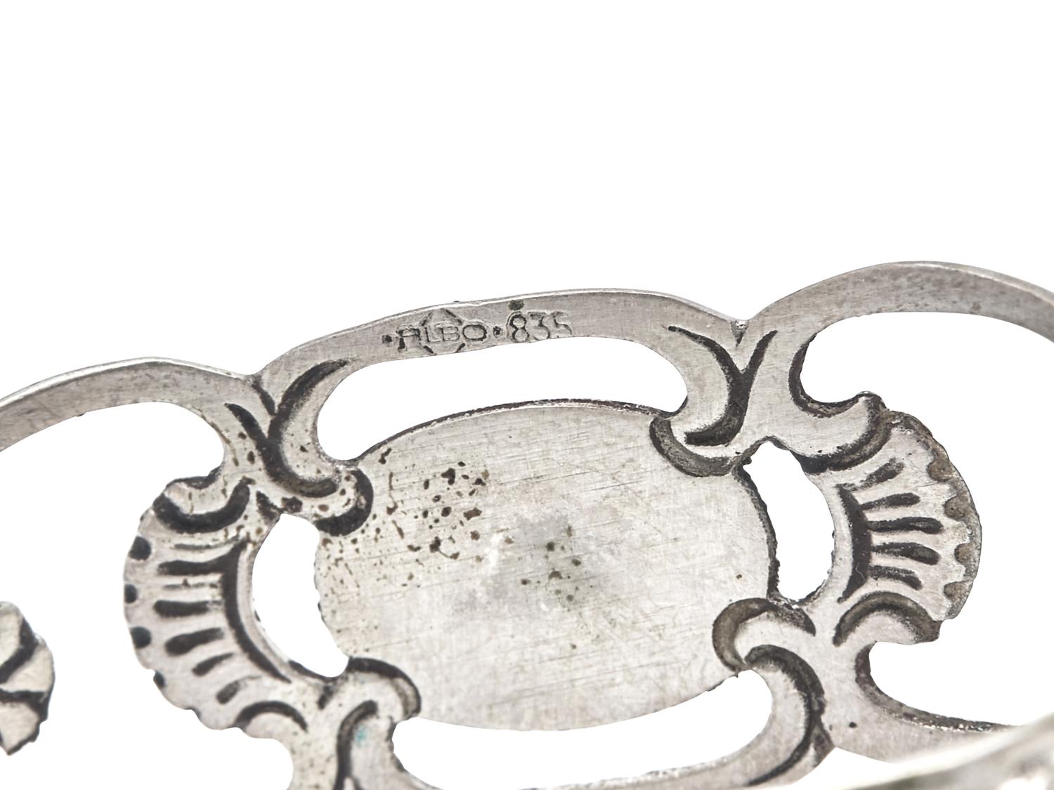 A Set of Fifteen German Silver Napkin Rings