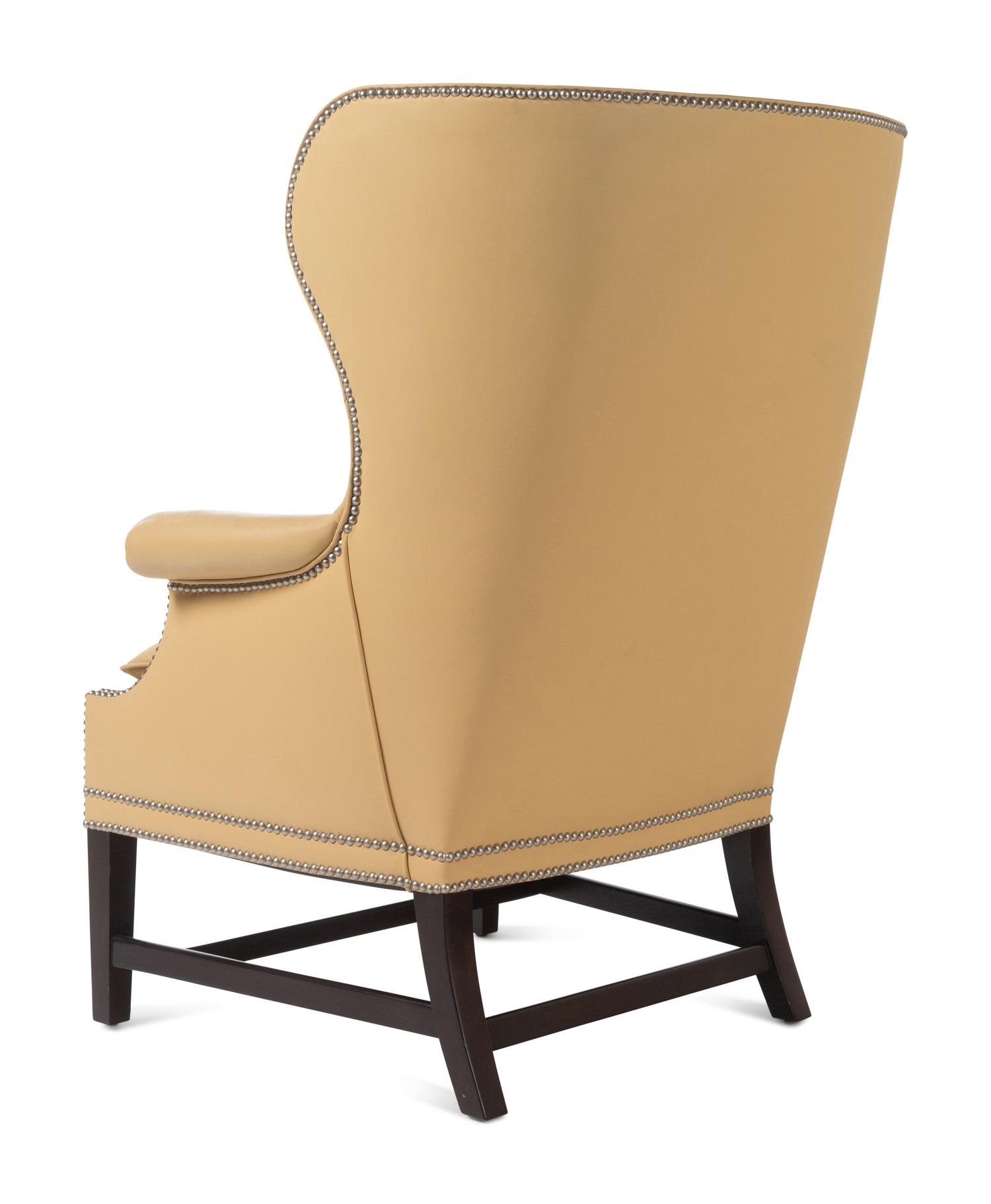 A Pair of Victoria Hagan Leather-Upholstered Wingback Armchairs