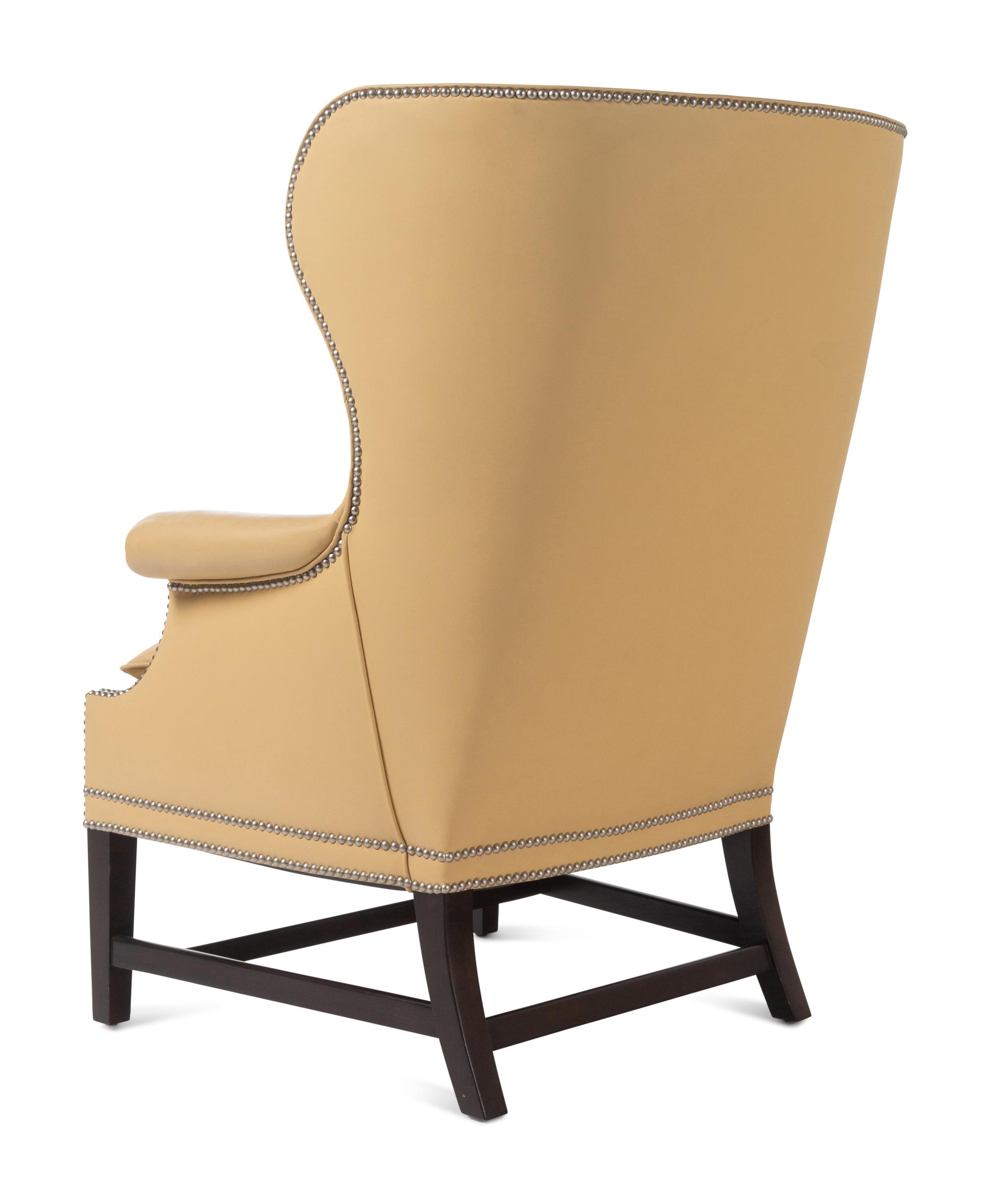 A Pair of Victoria Hagan Leather-Upholstered Wingback Armchairs