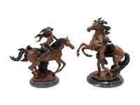 A Pair of Patinated Bronze Figural Groups