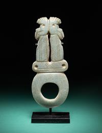 A Costa Rican Green Jade Double Avian Pendant