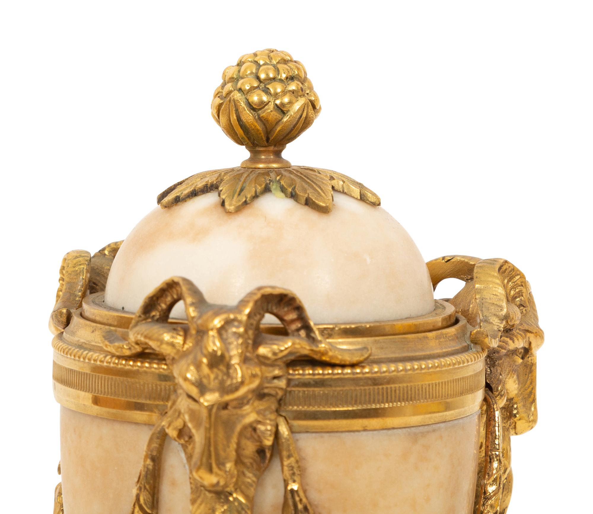 A Pair of Continental Gilt Bronze Mounted Marble Cassolettes