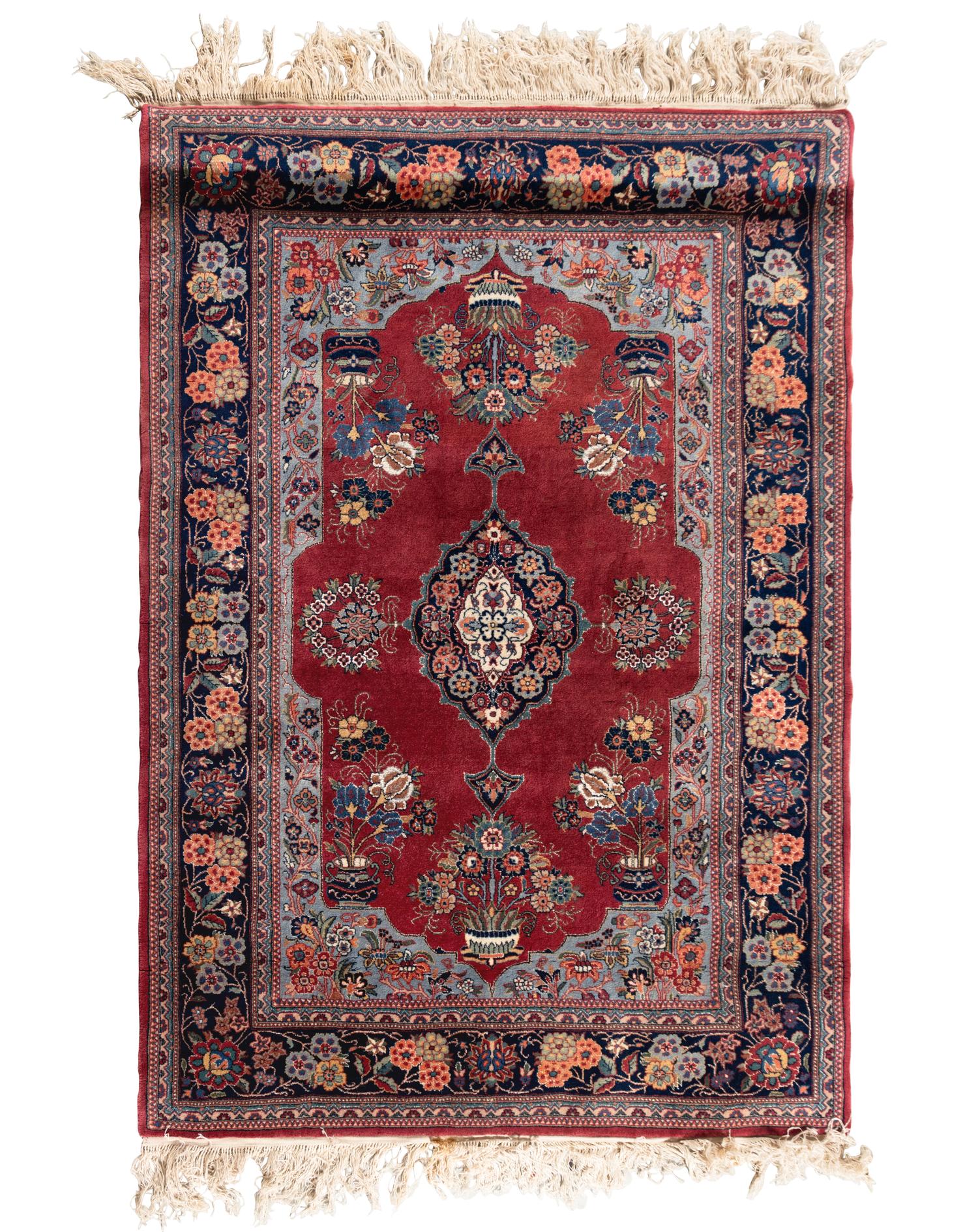 A Kashan Wool and Silk Rug