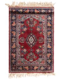A Kashan Wool and Silk Rug