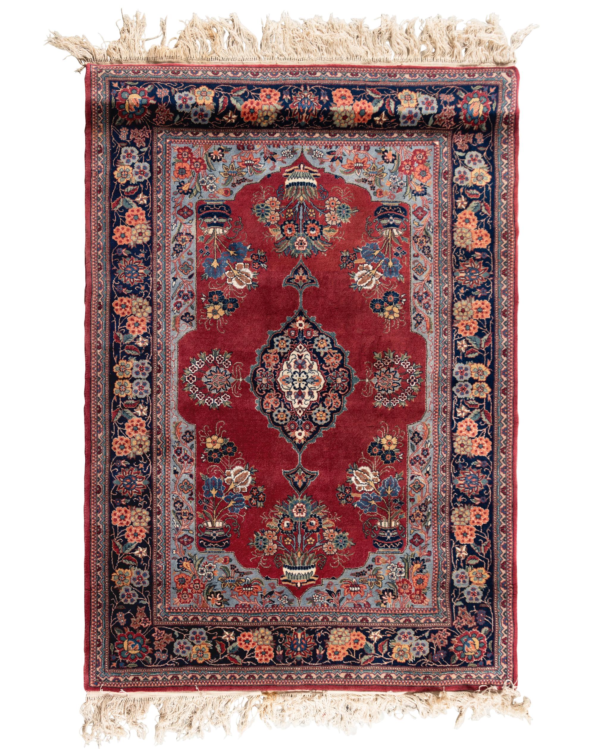 A Kashan Wool and Silk Rug