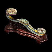 A Chinese Molded Famille Rose Porcelain Ruyi Scepter 粉彩瓷如意配木座