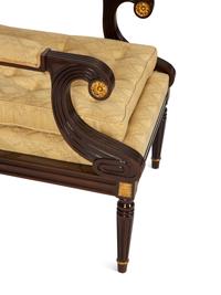 A French Empire Style Mahogany and Parcel Gilt Fauteuil