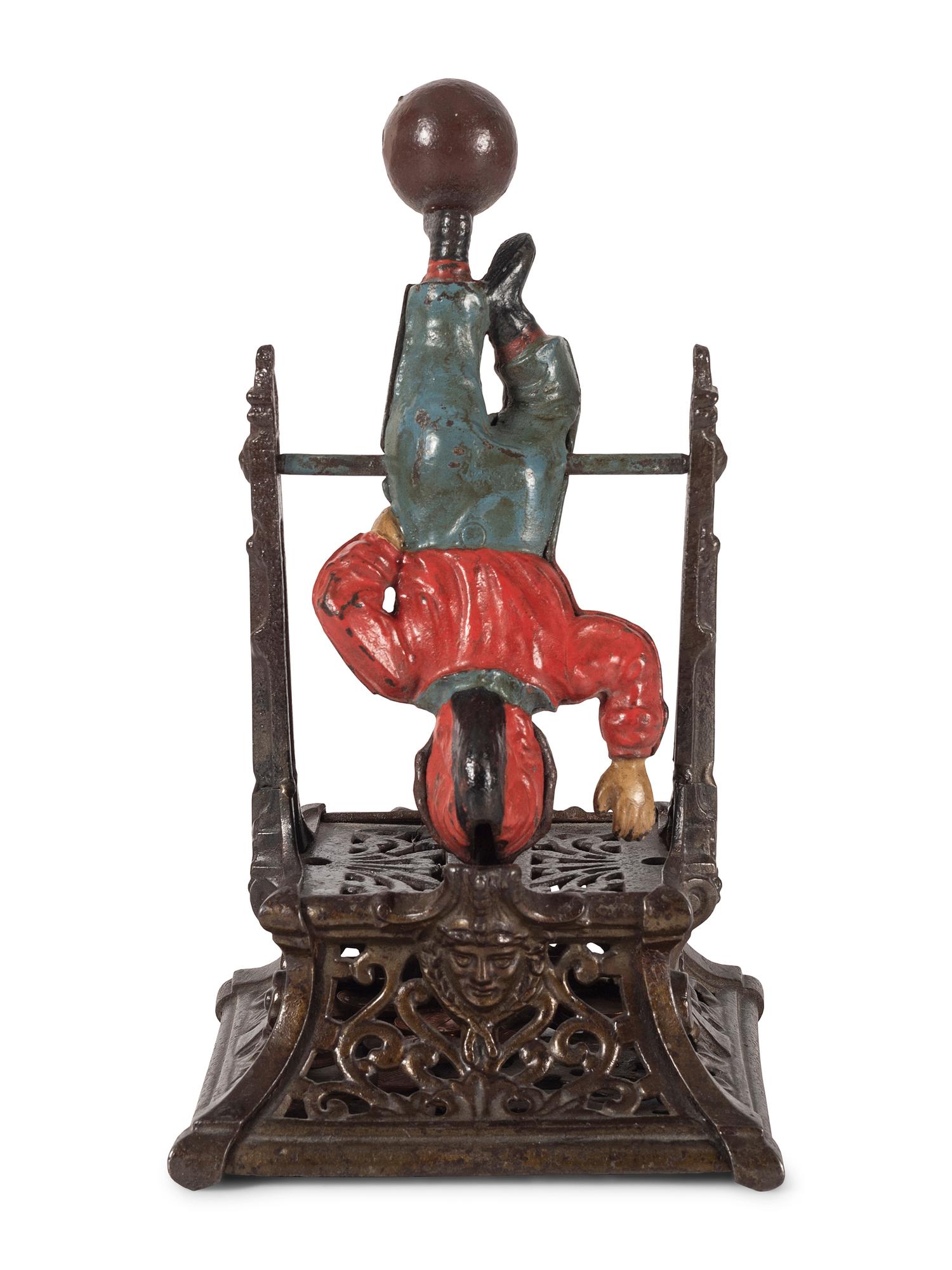 A Trapeze Boy Cast Iron Mechanical Bank