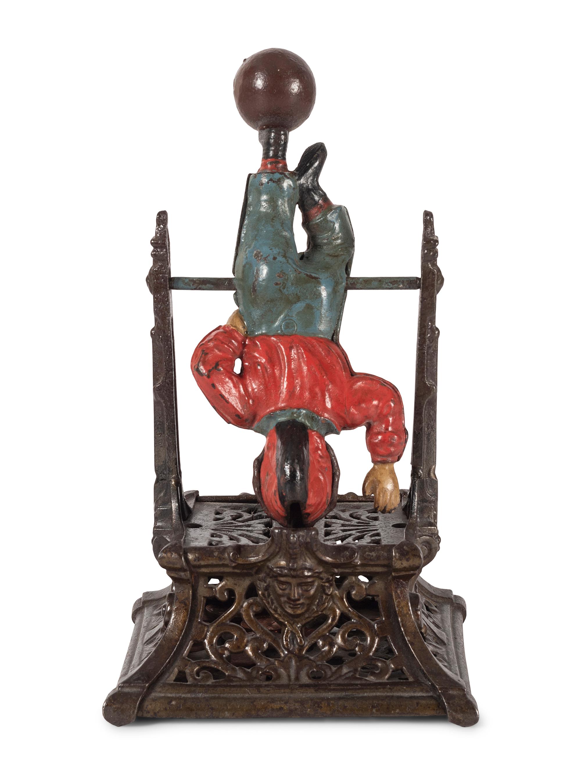A Trapeze Boy Cast Iron Mechanical Bank
