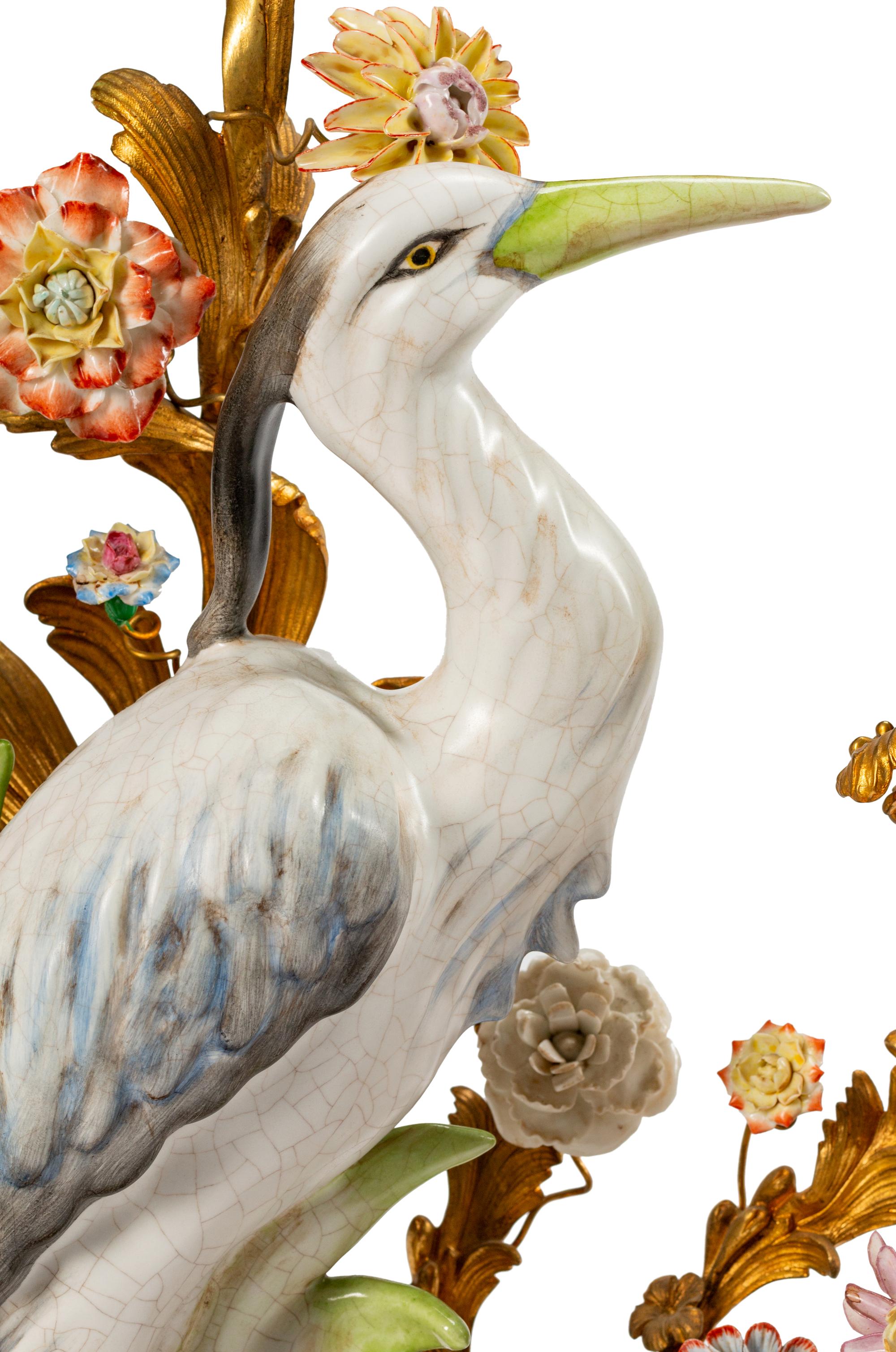 A Pair of Louis XV Style Gilt-Bronze and Porcelain Three-Light Candelabra