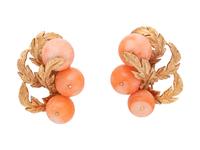 A Pair of 14 Karat Yellow Gold and Coral Leaf Earclips,