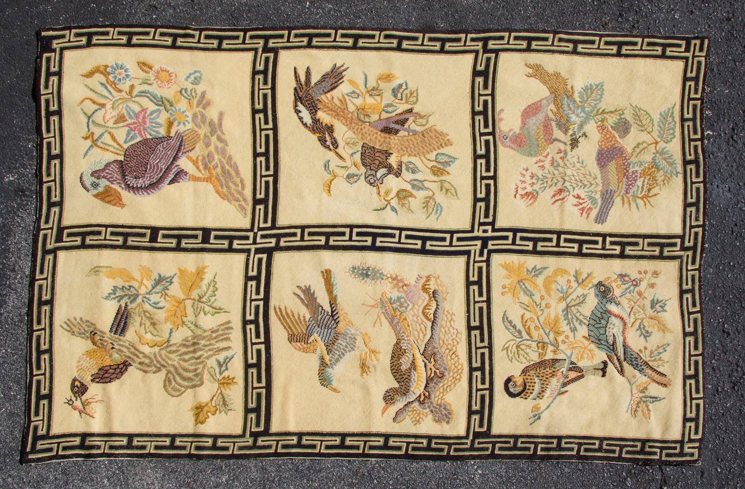 A Needlepoint Rug 68 x 44 inches. — 20TH CENTURY