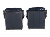 A Pair of Hancock and Moore Brass-Tacked Leather Chairs