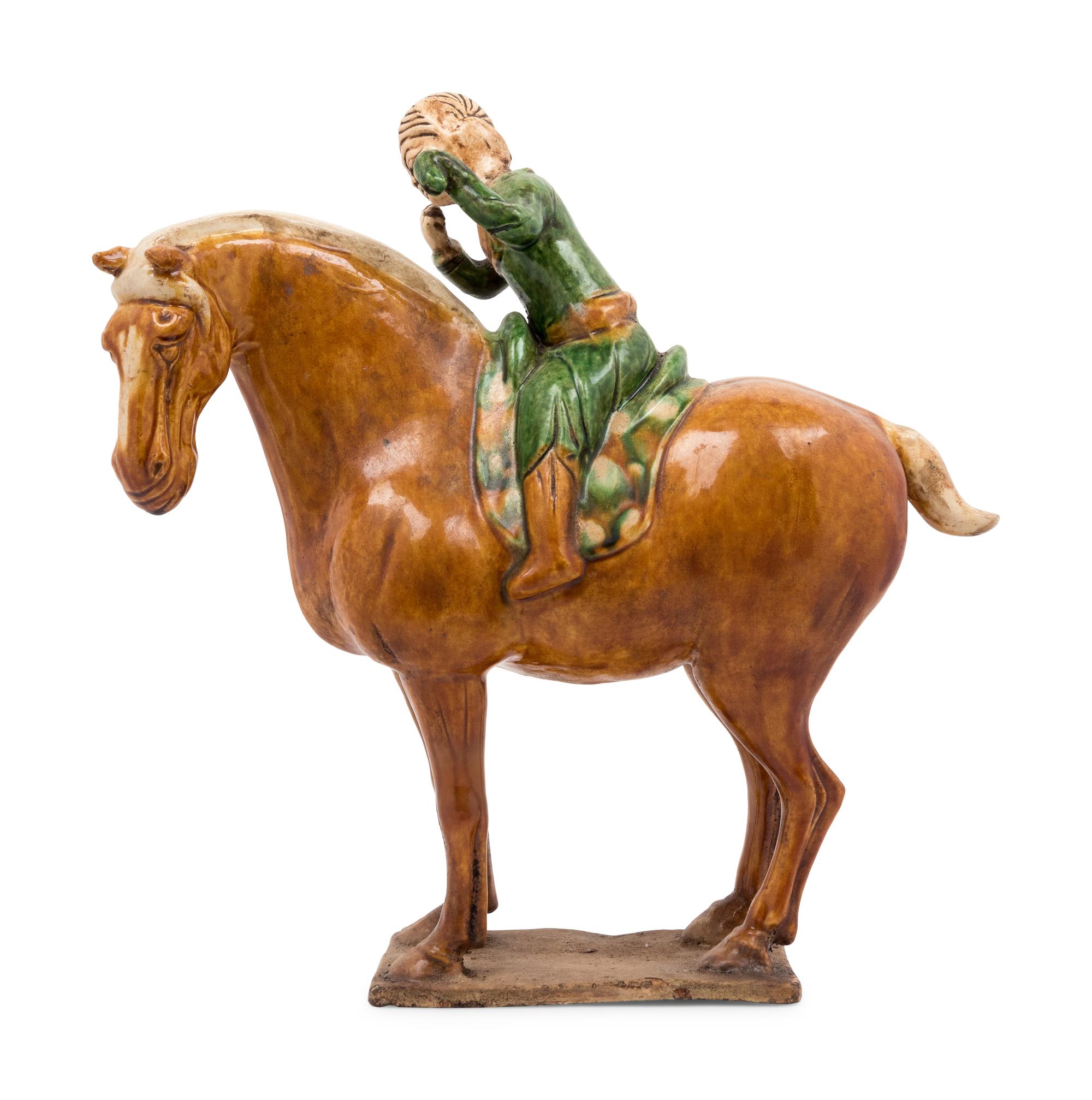 A Chinese Sancai Glazed Burial Figure of a Mounted Attendant