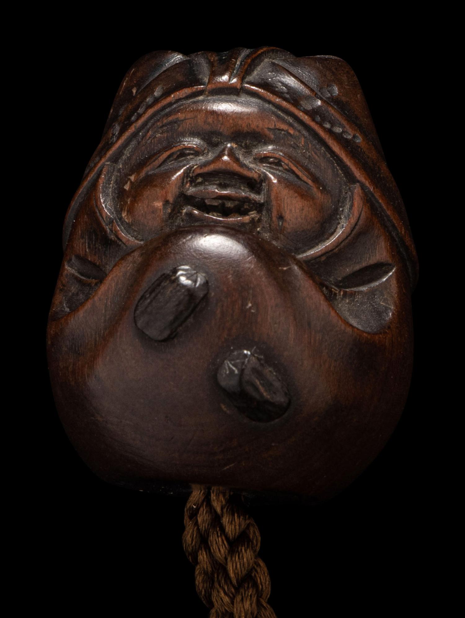 A Japanese Gold and Black Lacquer Four-Case Inro