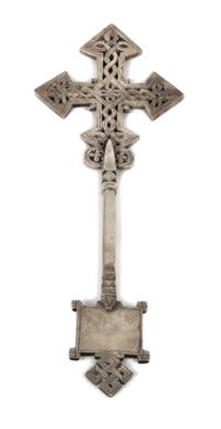 An Etched Silvered Metal Celtic Cross Desk Ornament Height 10 1/4 inches.