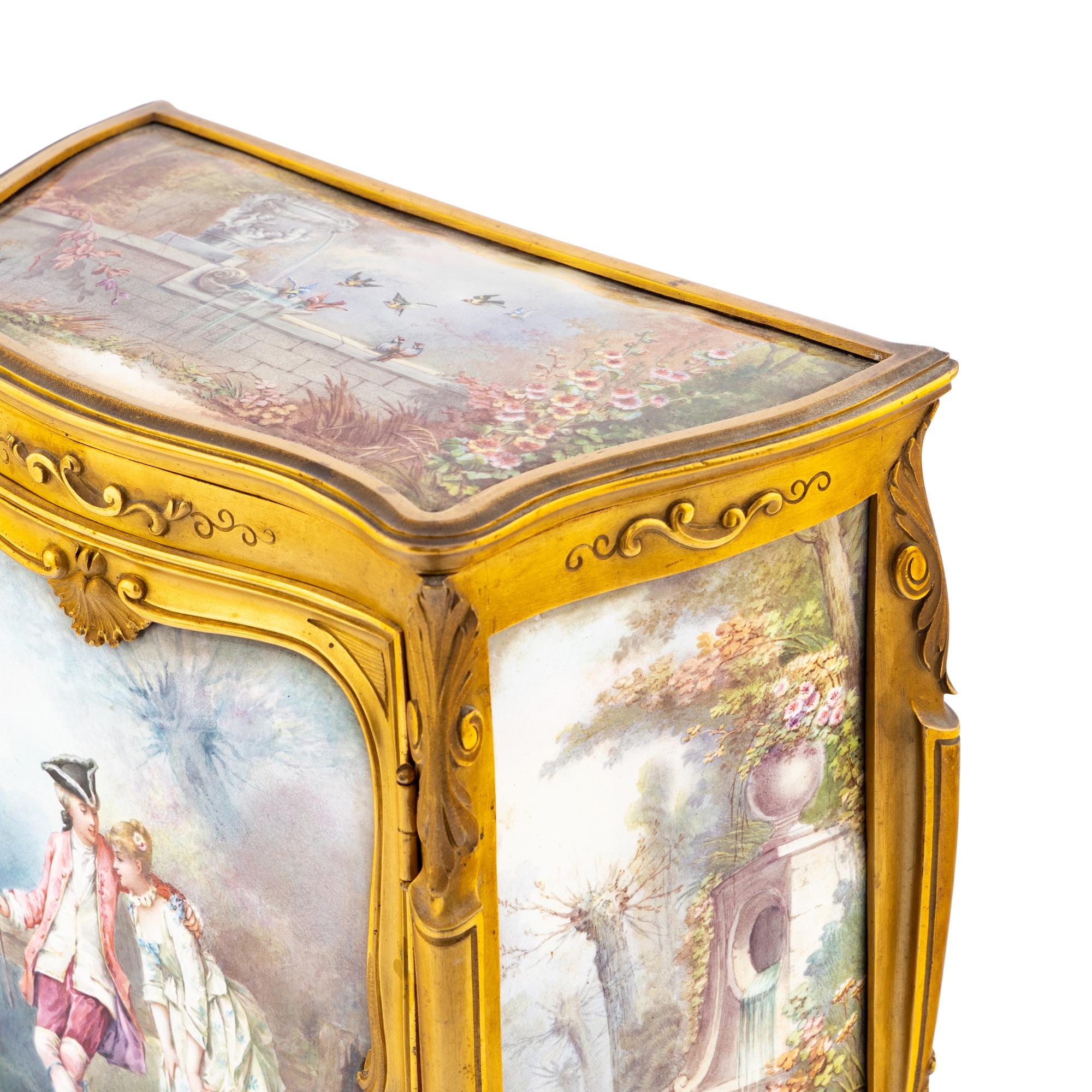 A French Gilt Bronze and Enamel Table Cabinet