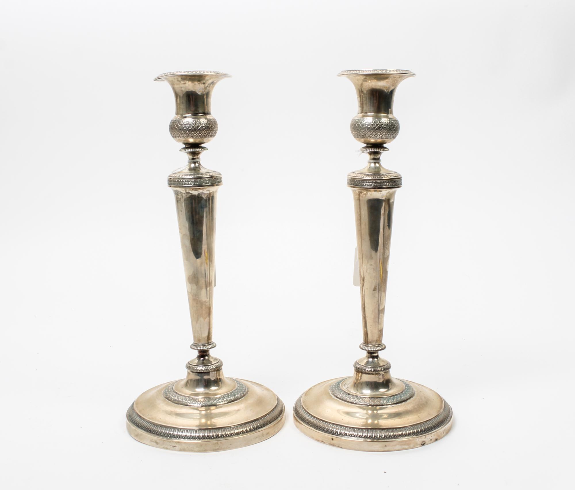 A Pair of Continental Silver Candlesticks