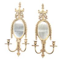 A Pair of Gilt Metal Girandole Mirrors