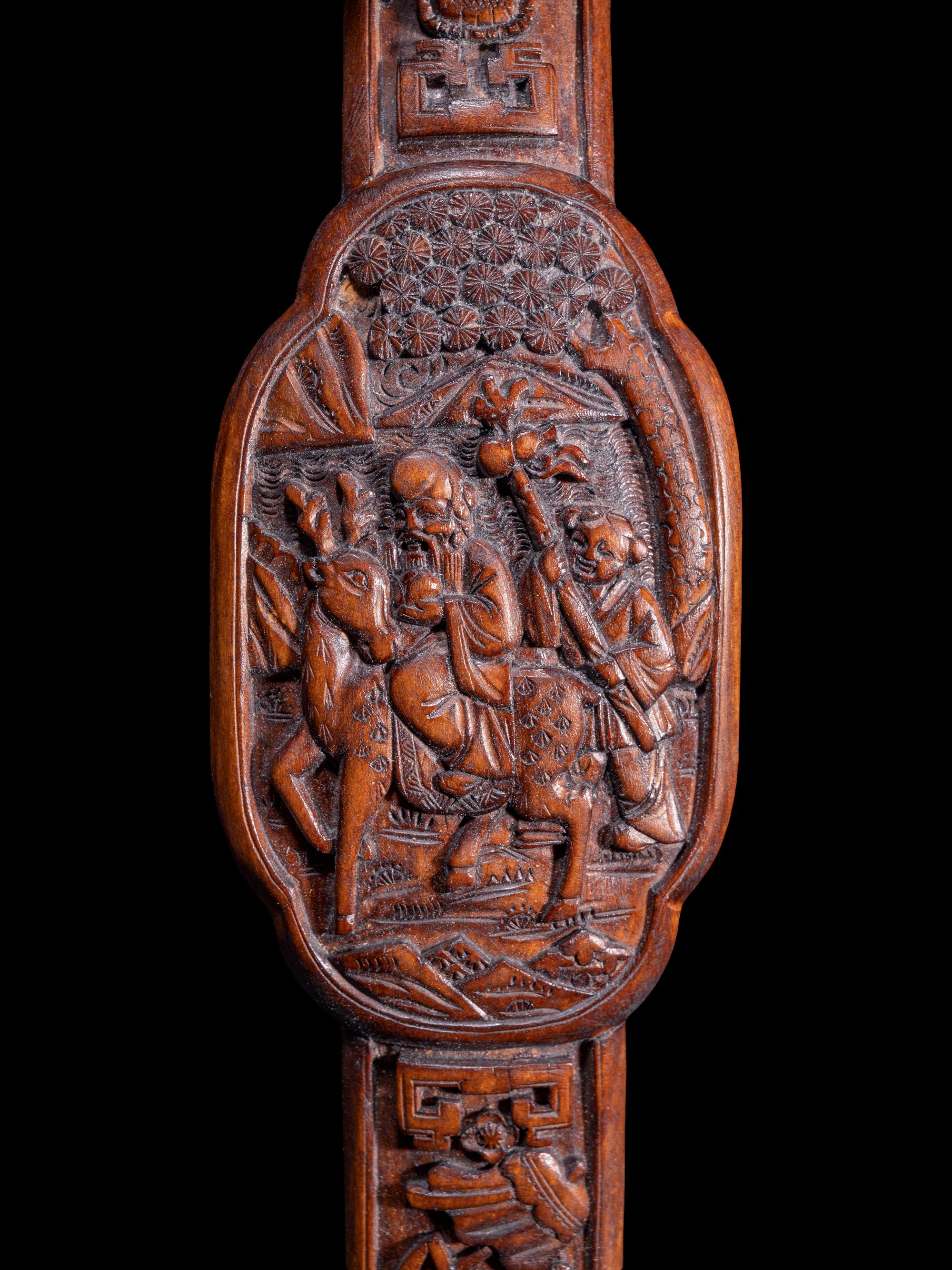 Two Chinese Carved Hardwood Ruyi Scepters