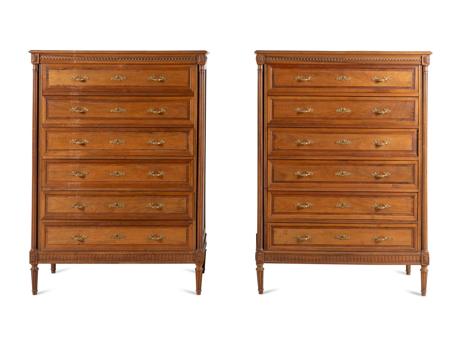 A Pair of Louis XVI Style Walnut Chests-of-Drawers