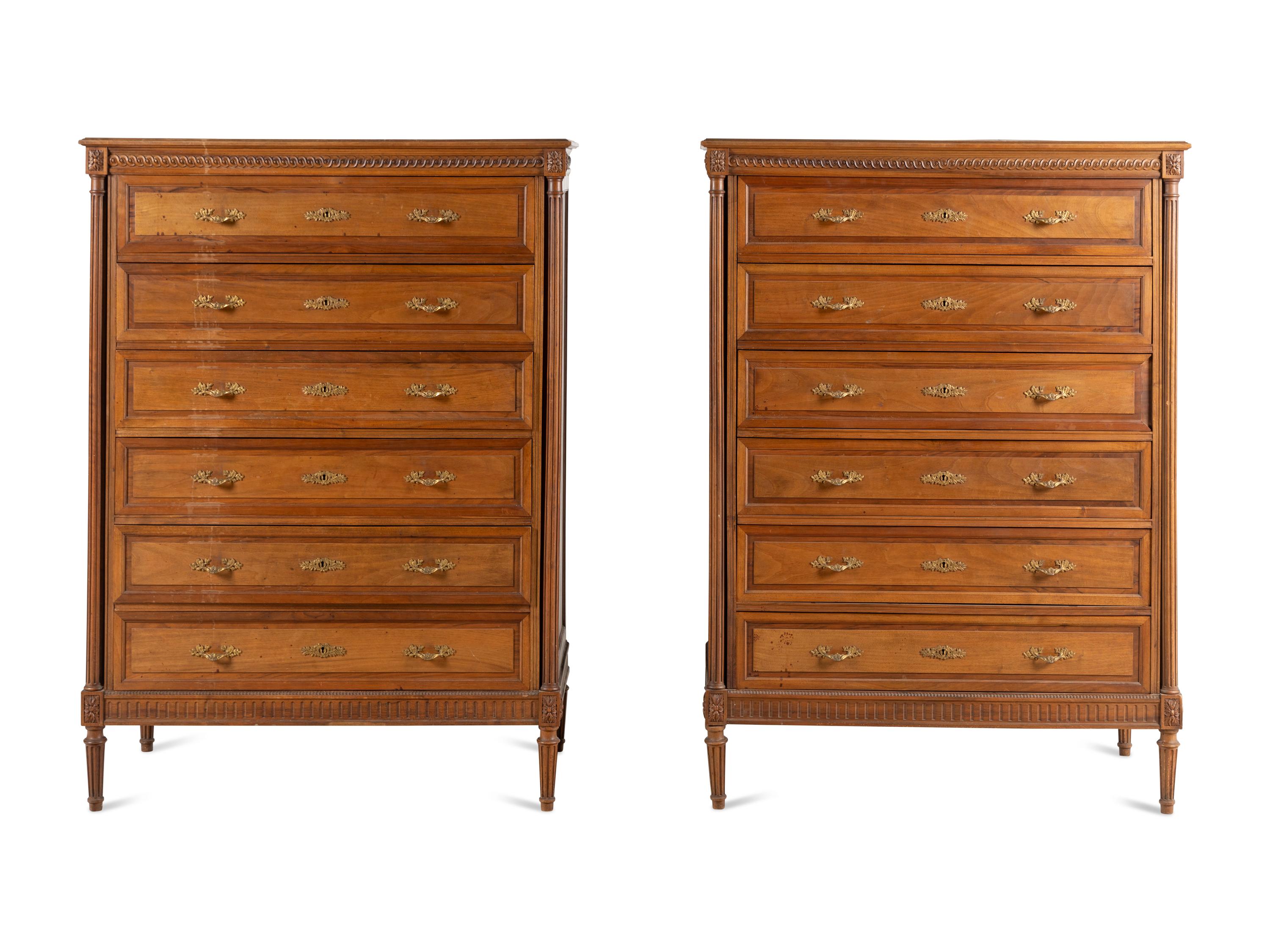 A Pair of Louis XVI Style Walnut Chests-of-Drawers