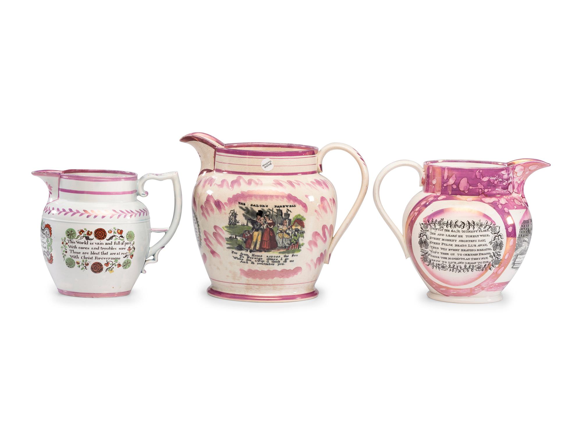 Three Pink Lusterware Pitchers