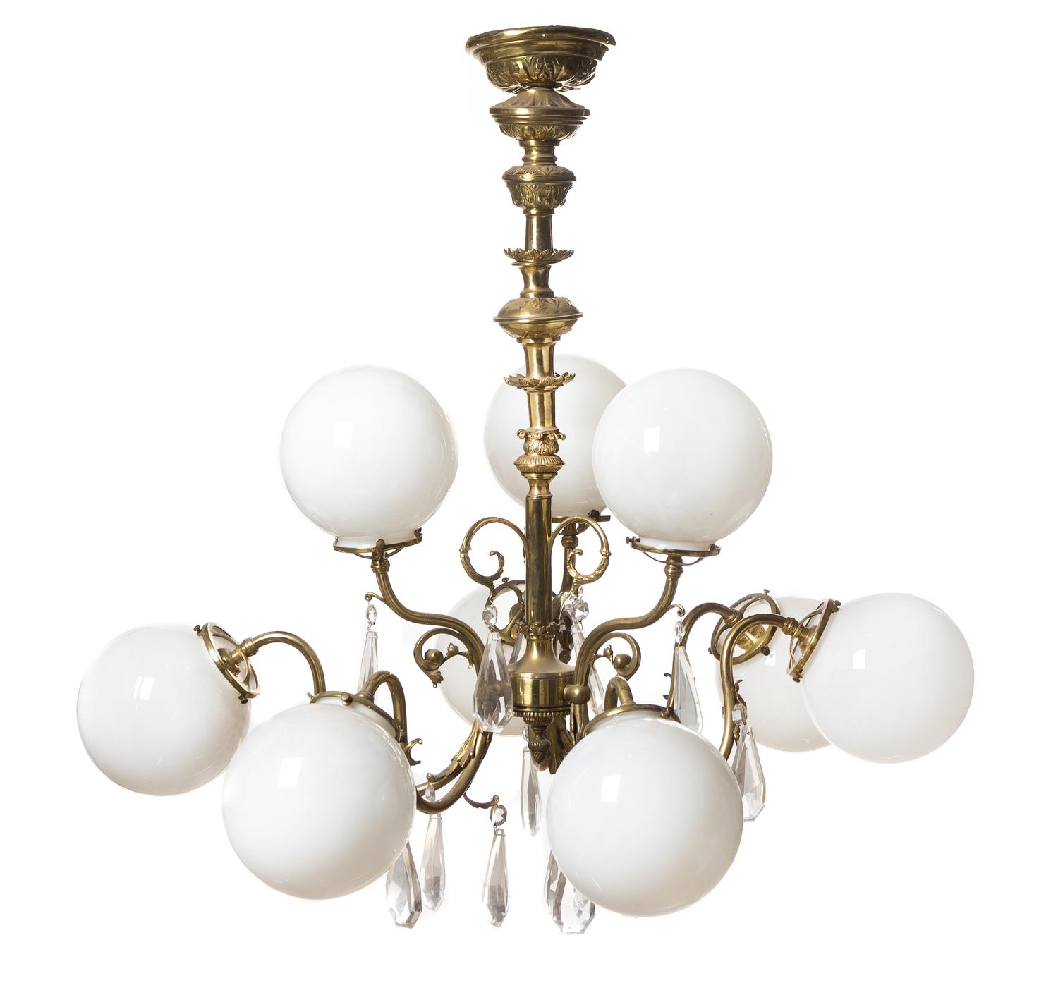 A Neoclassical Gilt Brass Nine-Light Chandelier, Height 35 x diameter 36 inches.