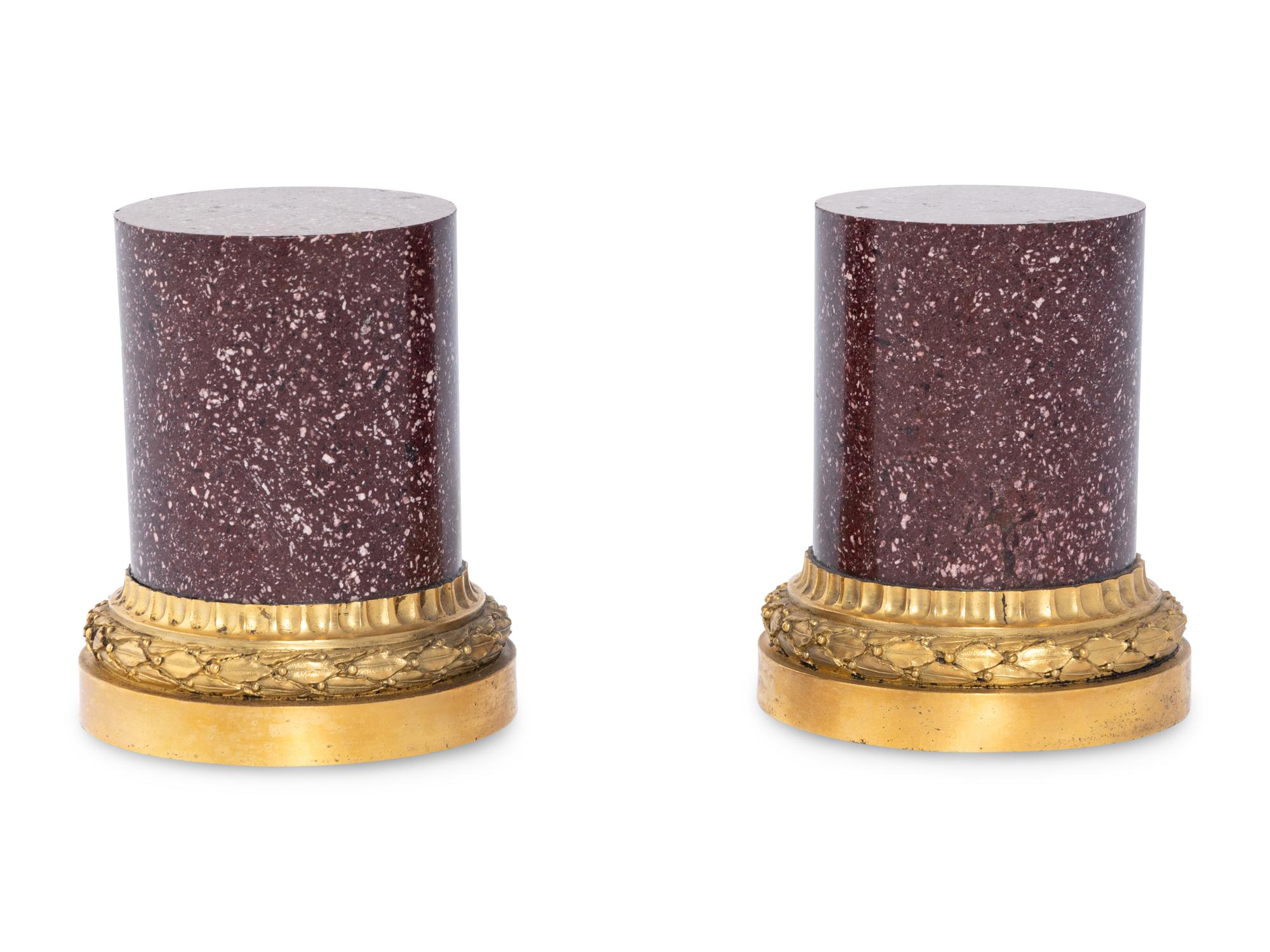 A Pair of French Gilt Bronze Mounted Porphyry Small Pedestals