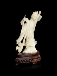A Chinese Jade Figure of a Female Immortal