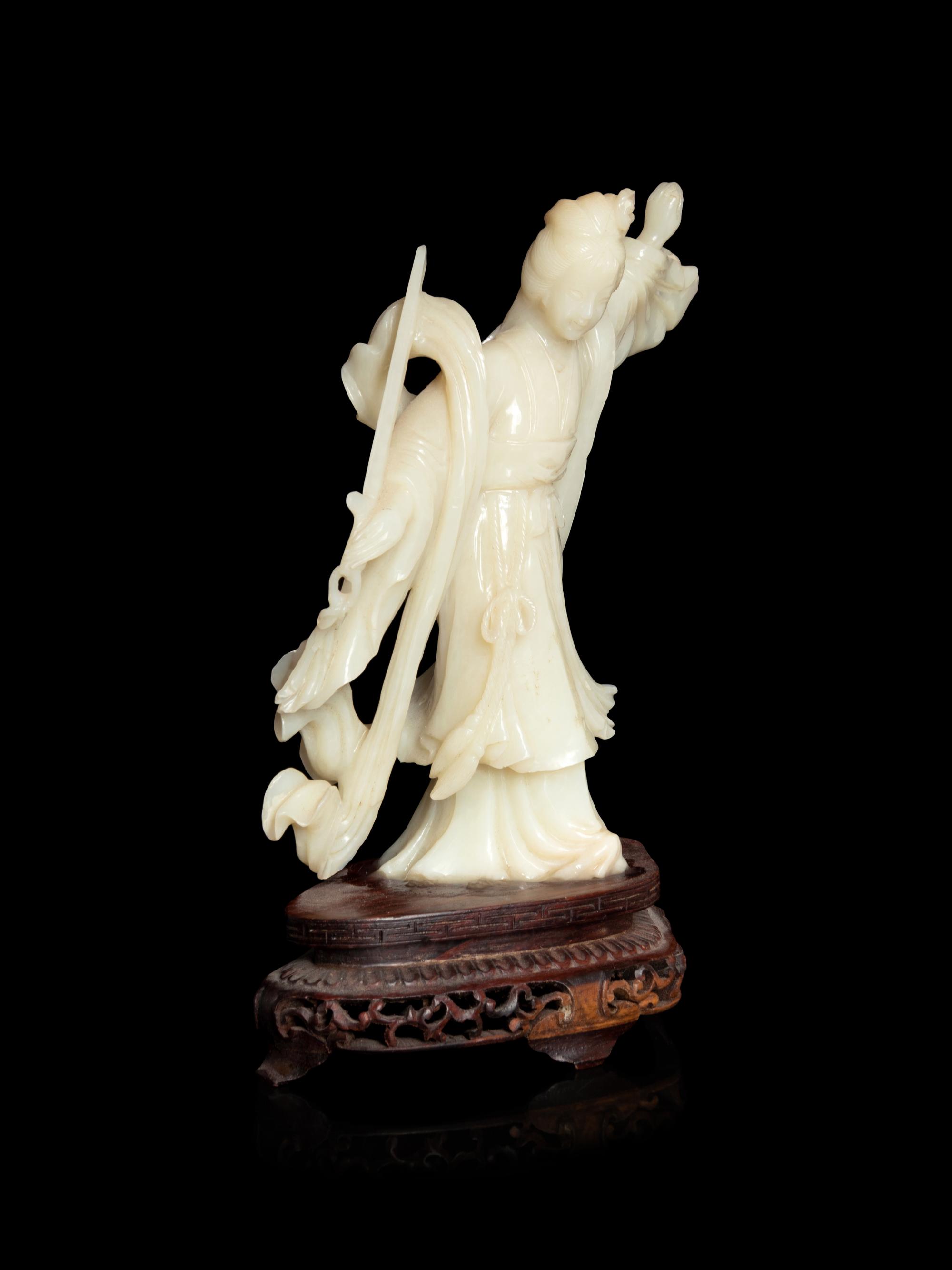 A Chinese Jade Figure of a Female Immortal