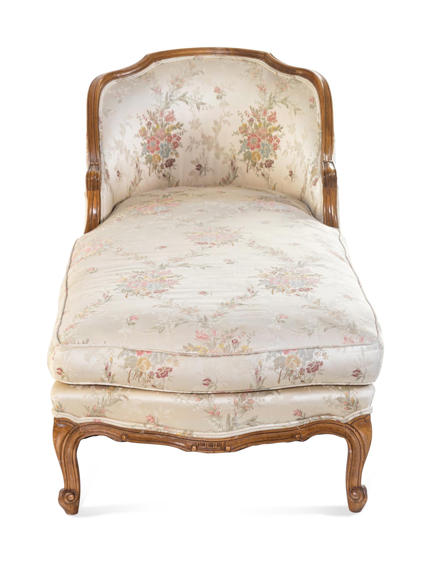A Louis XV Style Carved Walnut Chaise Longue