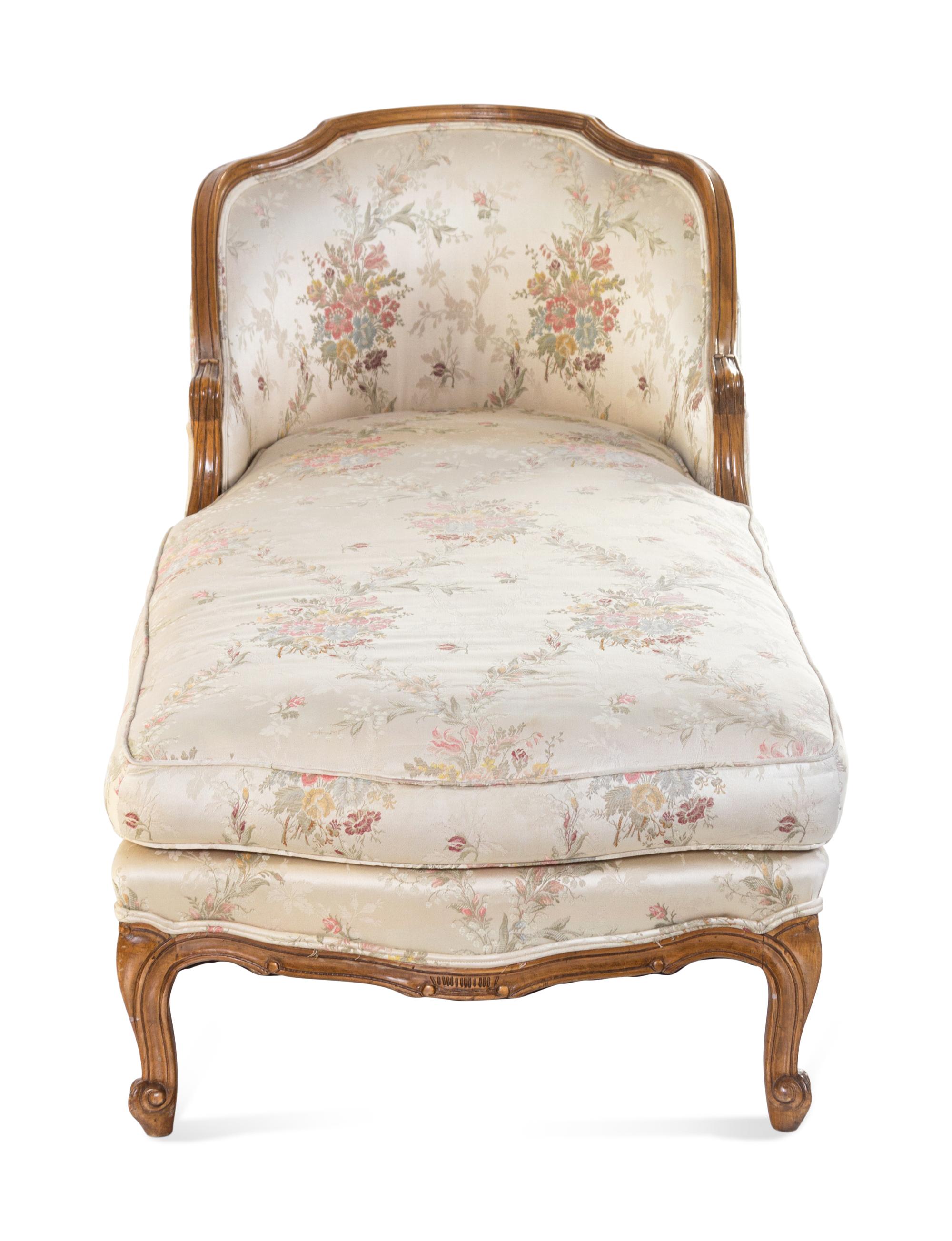 A Louis XV Style Carved Walnut Chaise Longue