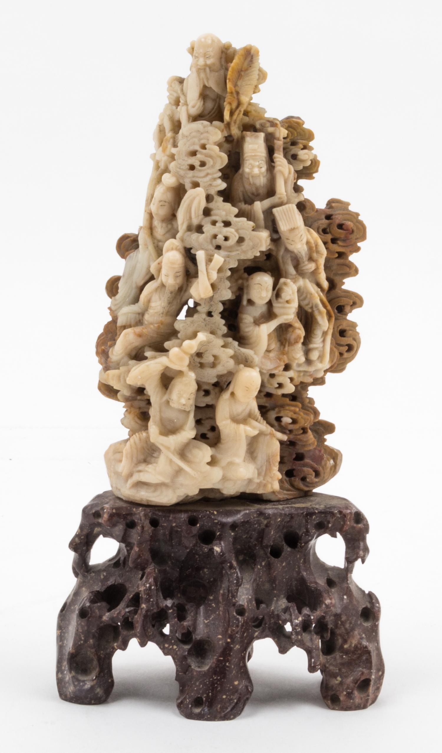 A Carved Soap Stone Figural Group Height 6 1/4 inches. — 20TH CENTURY