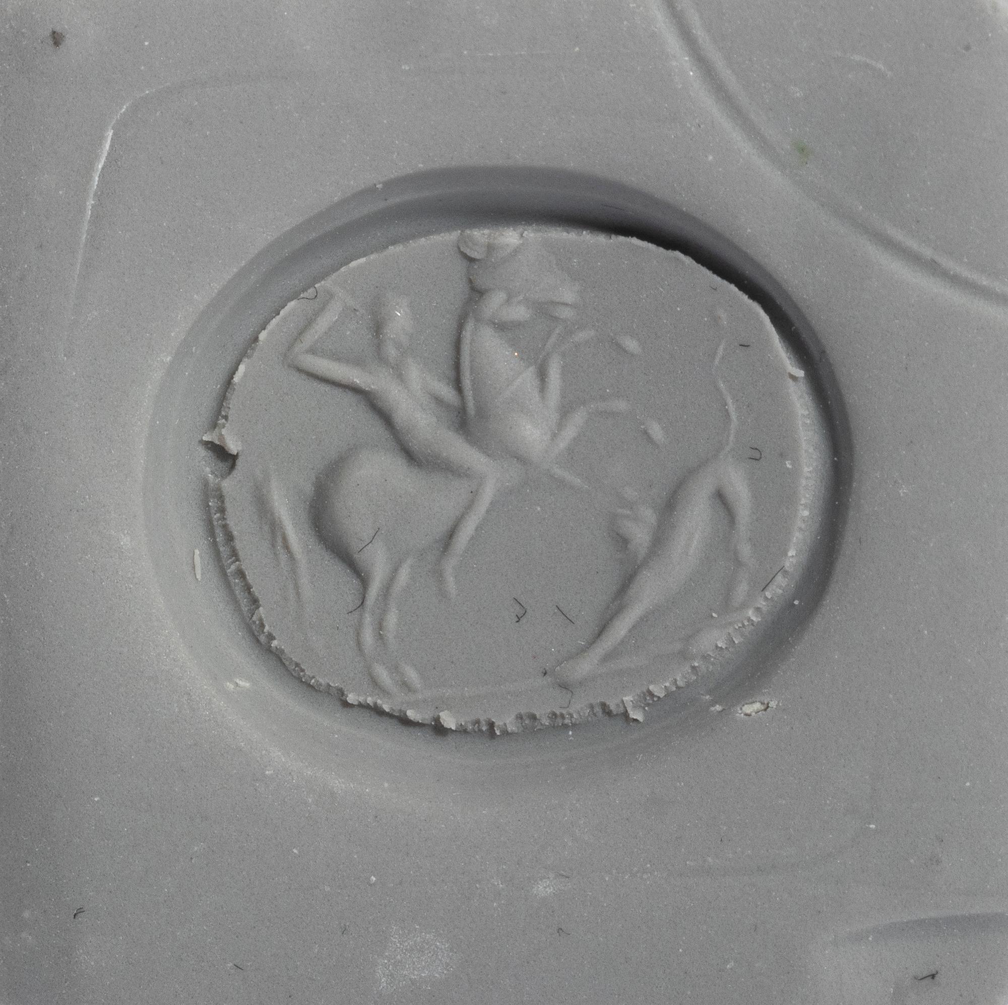 A Late Roman Agate Ring Stone with a Hunting Scene — Set in a gold band