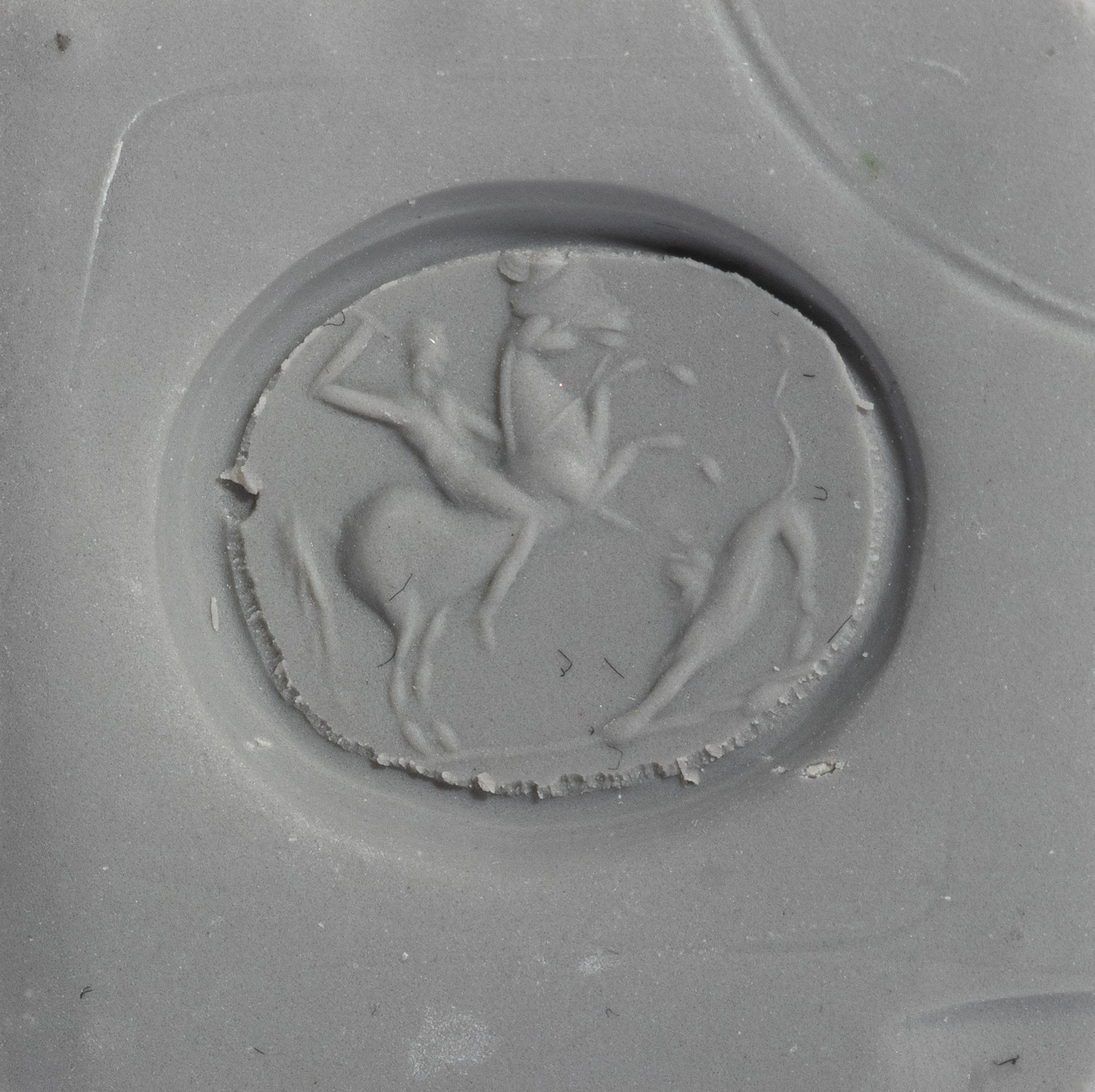 A Late Roman Agate Ring Stone with a Hunting Scene — Set in a gold band