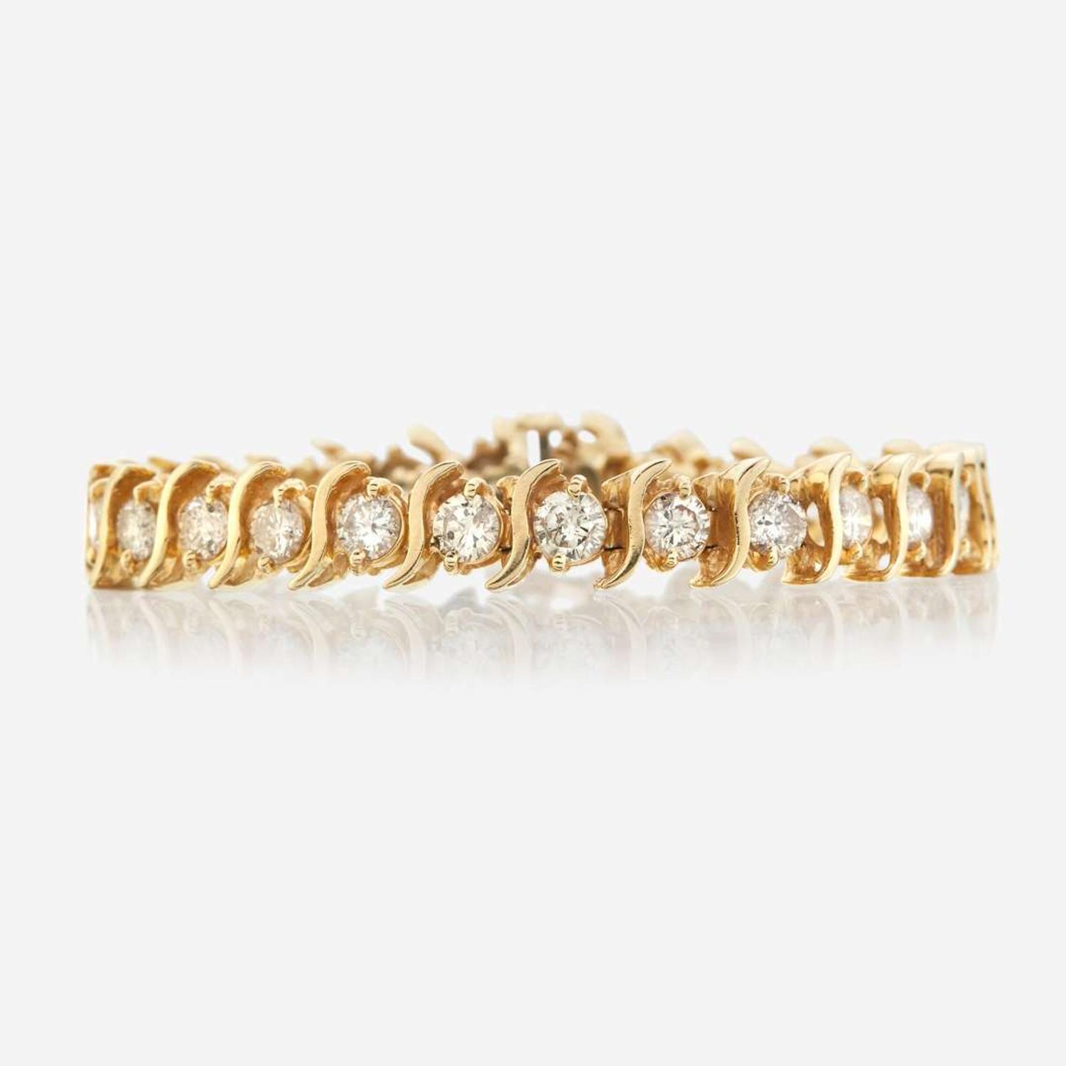A gold and diamond bracelet