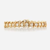 A gold and diamond bracelet