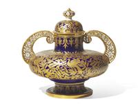 A Royal Crown Derby Parcel Gilt Twin-Handled Vase and Cover