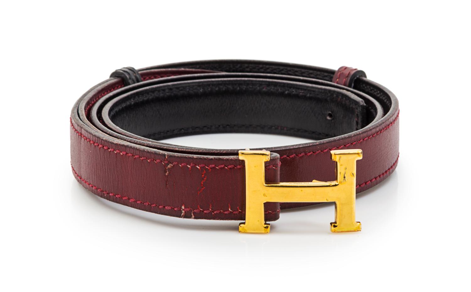 An Hermes Rouge Leather Mini Constance Belt,