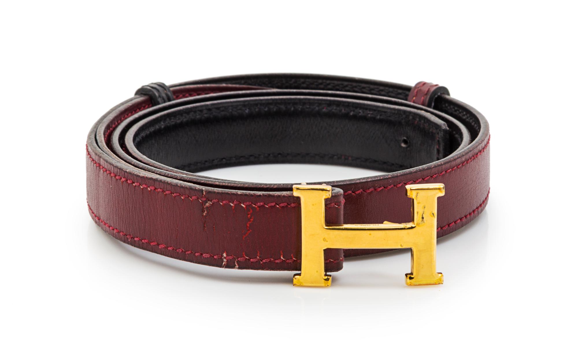 An Hermes Rouge Leather Mini Constance Belt,