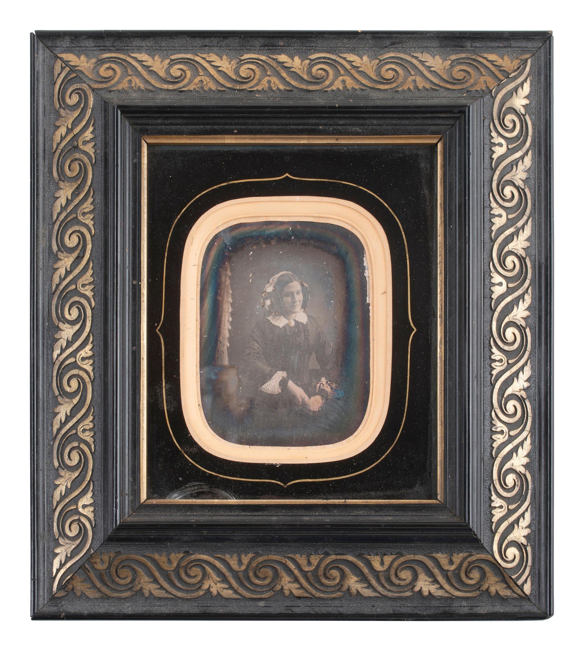 [EARLY PHOTOGRAPHY]. 7 charming daguerreotype portraits housed in frames.