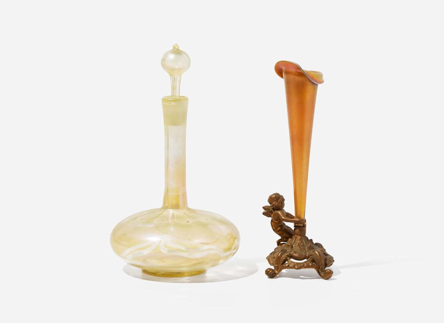 Tiffany Studios (American, active 1878-1932) and Quezal Art Glass and Decorating Co. (American, c. 1901-1924), A Favrile Glass Decanter and An Iridescent Glass Trumpet Vase on Gilt Bronze Base, New York, NY, early 20th century