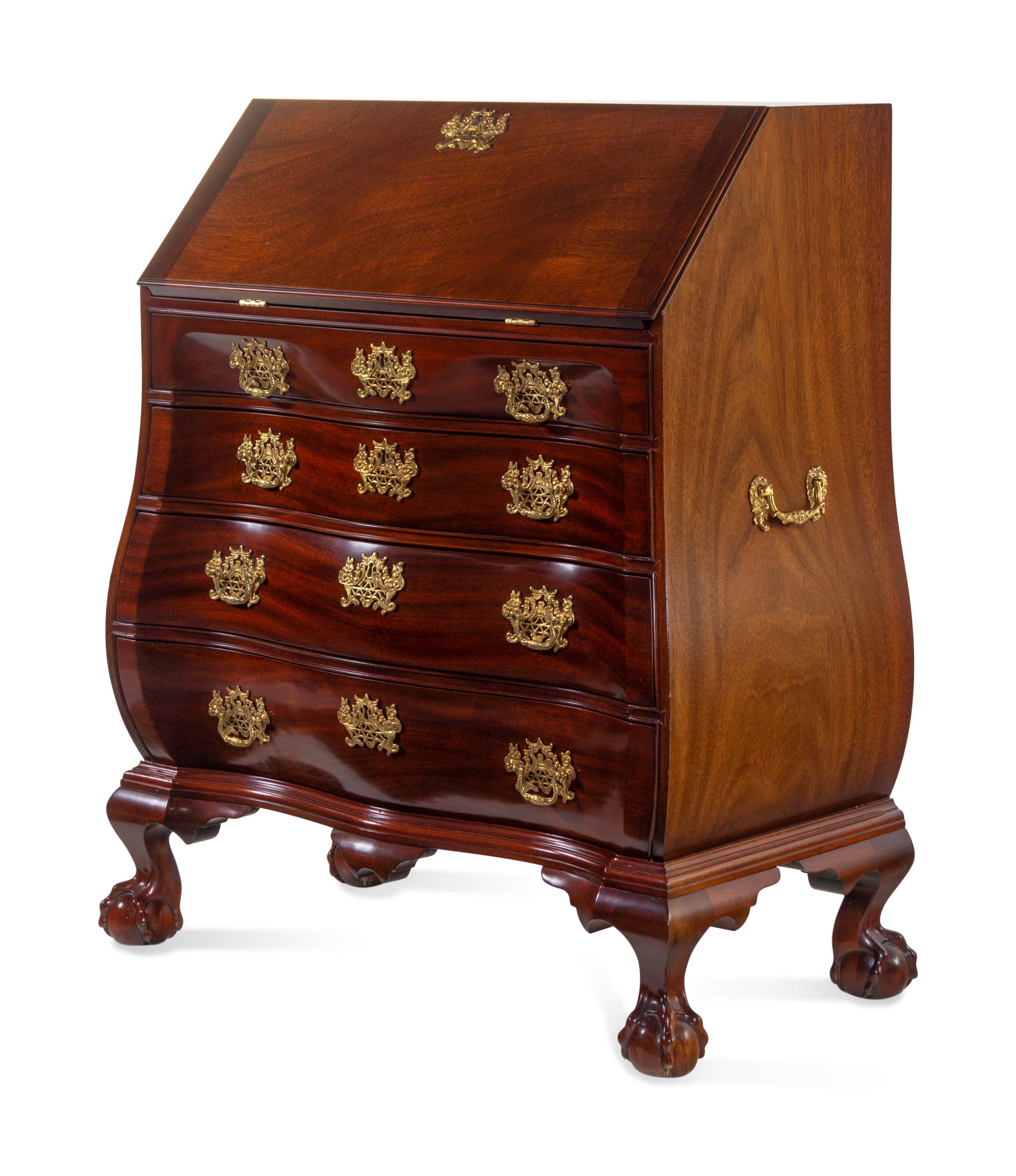 A Chippendale Style Carved Mahogany Bombe-Form Slant-Front Desk