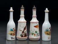 Four Milk Glass Barber Bottles
