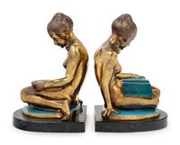 A Pair of Gilt Metal Figures of Seated Maidens