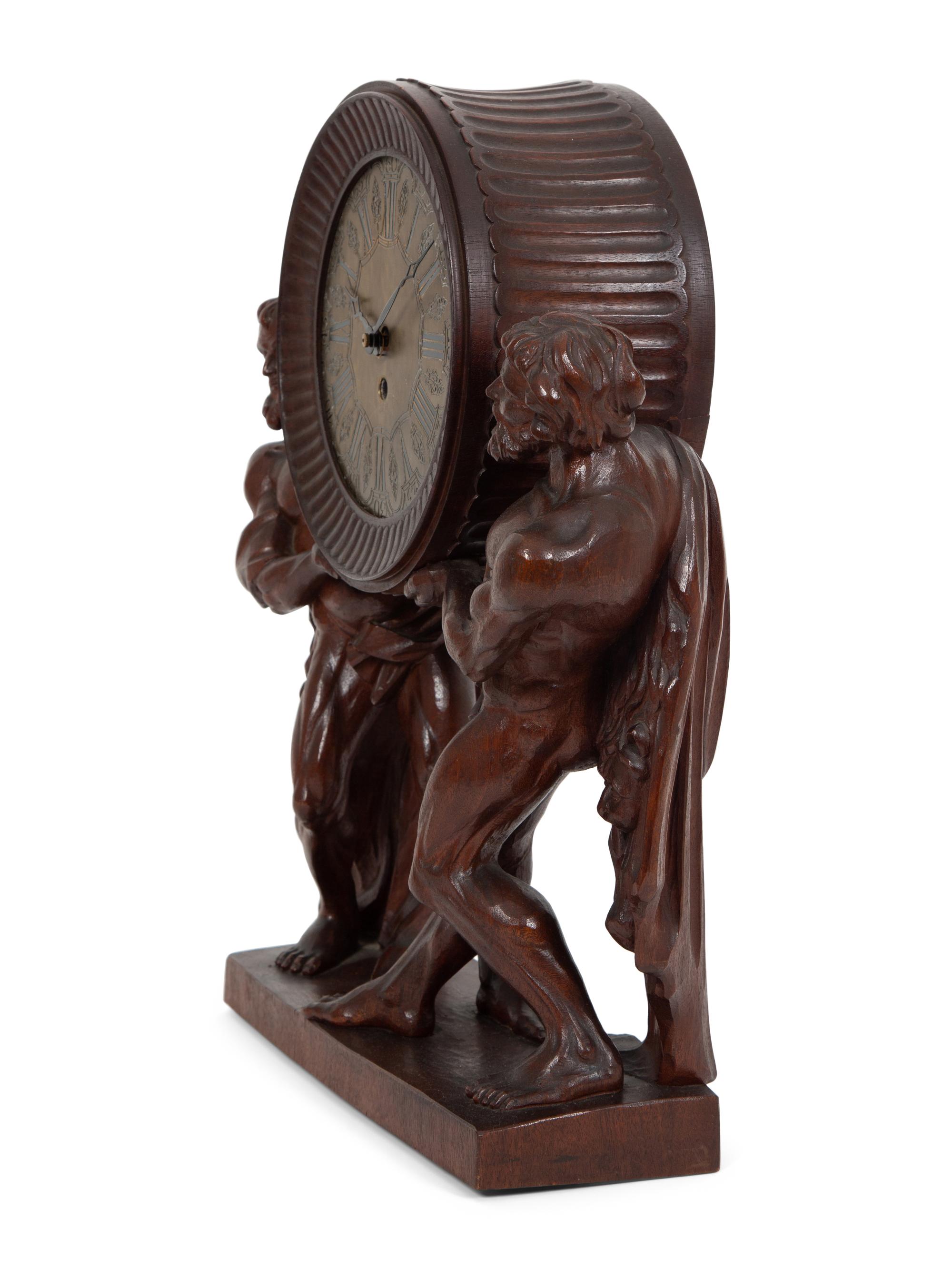 A Continental Carved Oak Figural Clock