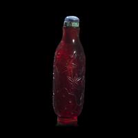 A Chinese Carved Ruby Glass Snuff Bottle, Probably Imperial Workshop, 18th Century