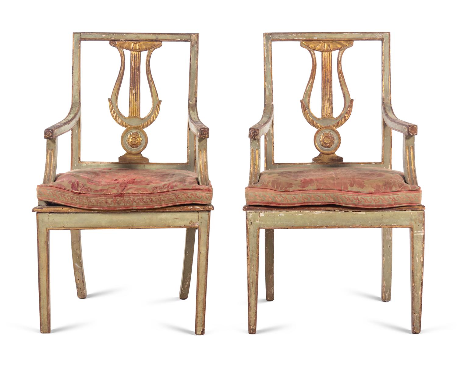 A Pair of Italian Painted and Parcel Gilt Lyre-Back Armchairs