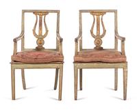 A Pair of Italian Painted and Parcel Gilt Lyre-Back Armchairs